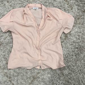 L Calvin Klein pink shirt